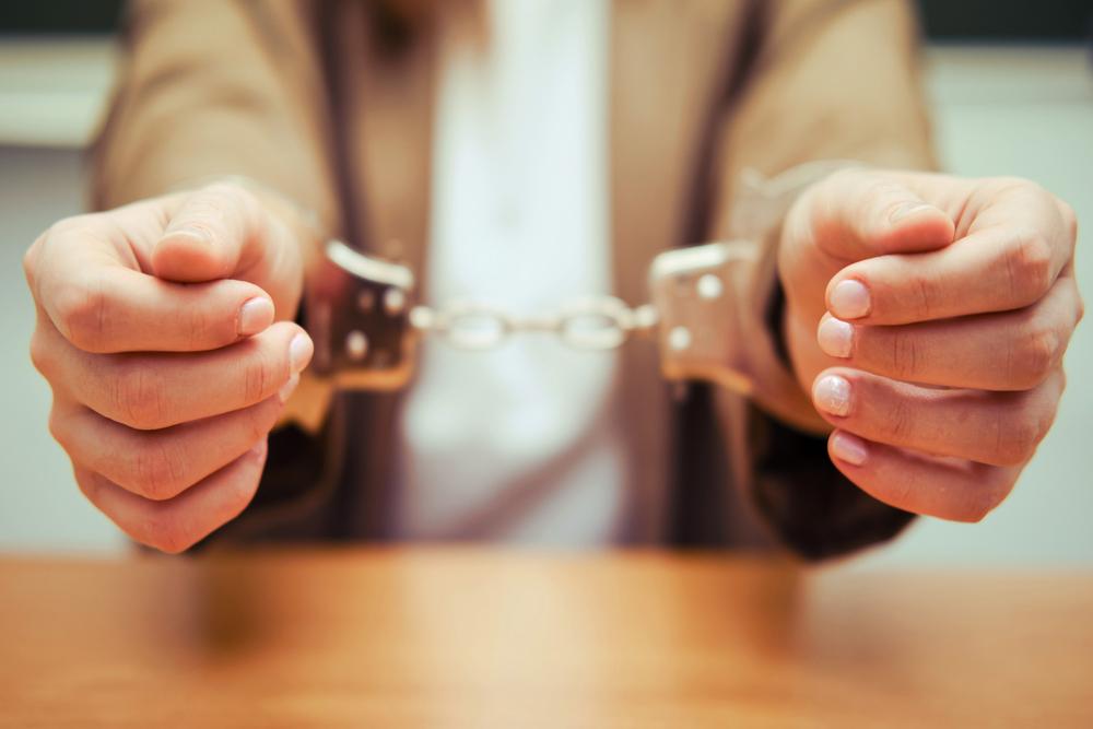 Woman in Handcuffs After DUI